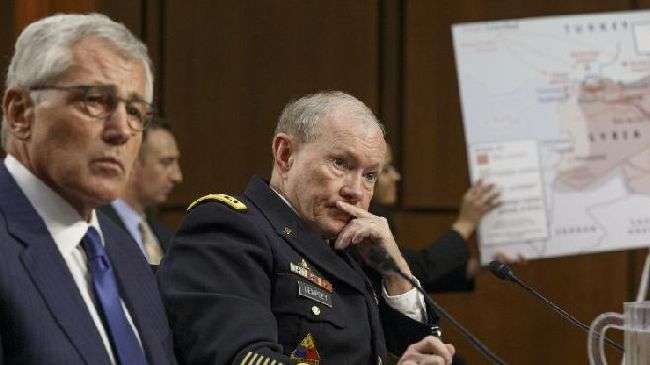 US Defense Secretary Chuck Hagel and Army Gen. Martin Dempsey (right), chairman of the Joint Chiefs of Staff, appear before the Senate Armed Services Committee, in Washington, Tuesday, Sept. 16, 2014.