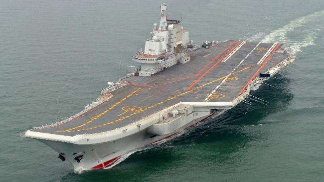 This file photo shows a Chinese aircraft carrier cruising for a test on the sea.