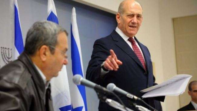 Former Israeli Prime Minister Ehud Olmert (R) and his predecessor Ehud Barak