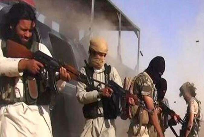 ISIL Takfiri terrorists execute 12 Shia fighters in Iraq