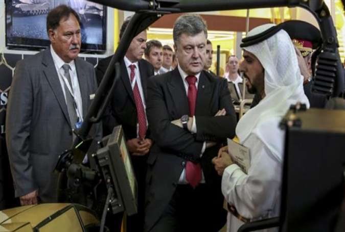 Ukrainian President Petro Poroshenko (2nd R) at UAE’s International Defense Exhibition and Conference (IDEX) in Abu Dhabi February 24, 2015.