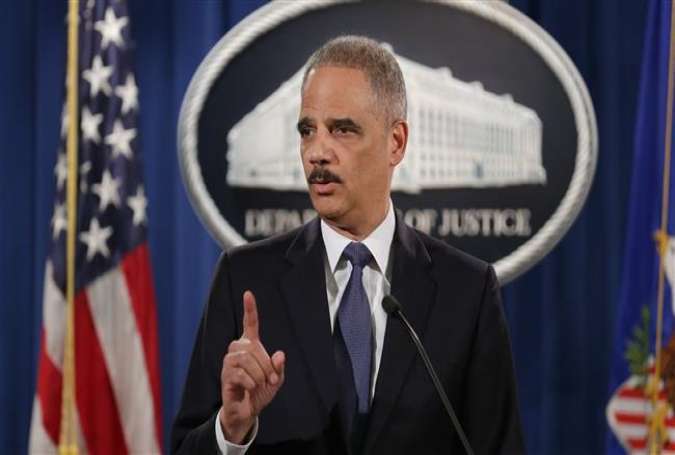 US Attorney General Eric Holder delivers remarks about the Justice Department