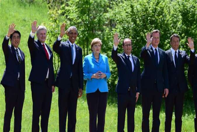 (From left to right) The leaders of Japan, Canada, US, Germany, France, Britain and Italy pose for a photo at the start of a G7 summit in Bavaria, southern Germany, June 7, 2015.