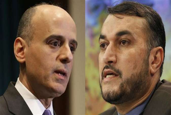 Hossein Amir-Abdollahian, the Iranian deputy foreign minister for Arab and African affairs (R) and Saudi Foreign Minister Adel al-Jubeir