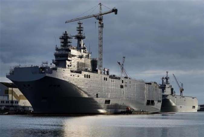 The Sevastopol (foreground) and the Vladivostok warships in Saint-Nazaire, western France, on December 20, 2014.