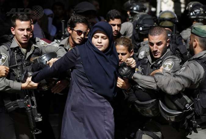 زن فلسطینی اسیر چنگال‌های ۵ نظامی صهیونیستی + عکس