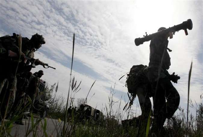 Indian troops running to take position during an attack at Raj Bagh police station in Kathua district, near Jammu.