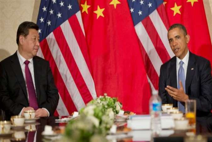 US President Barack Obama (R) during a bilateral meeting with Chinese President Xi Jinping at the US Ambassador