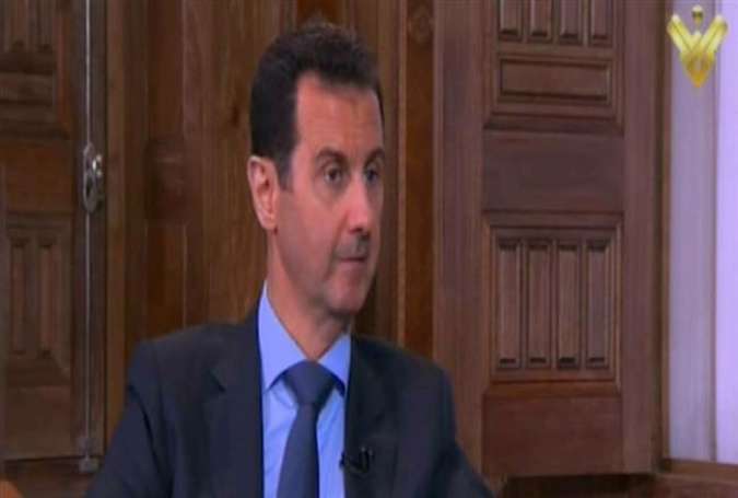 Syrian President Bashar al-Assad answering questions from al-Manar journalists during an interview in Damascus, Syria.