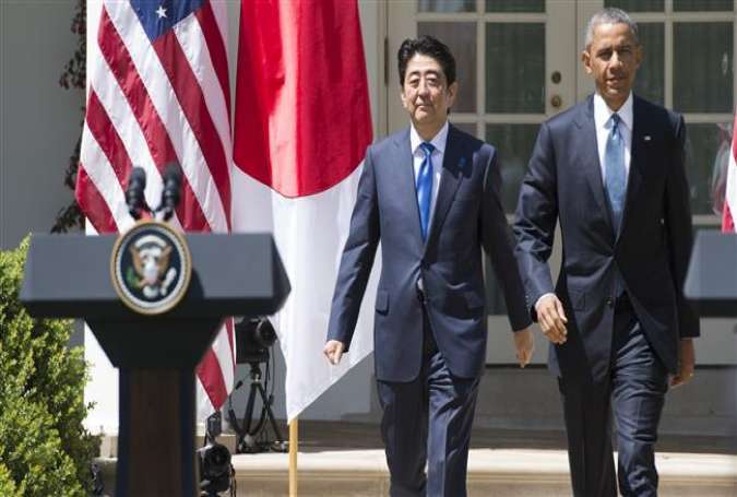 Obama and Abe hold a joint press conference in the Rose Garden of the White House in Washington, DC, April 28, 2015.