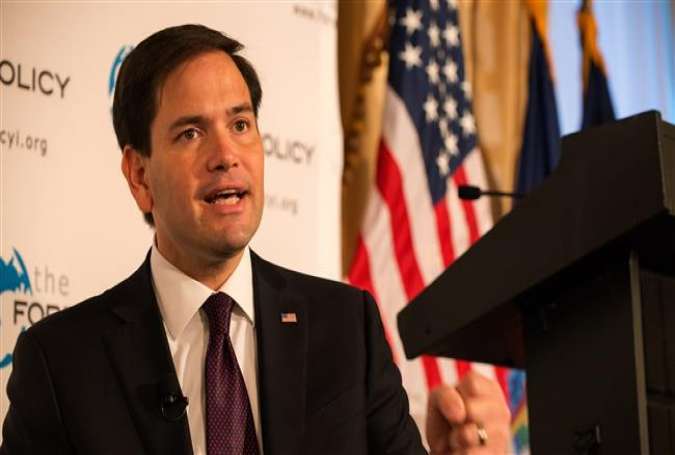 Republican US presidential candidate Sen. Marco Rubio (R-FL) speaks with attendeees following a hosted by the Foreign Policy Initiative at the 3 West Club on August 14, 2015 in New York City.