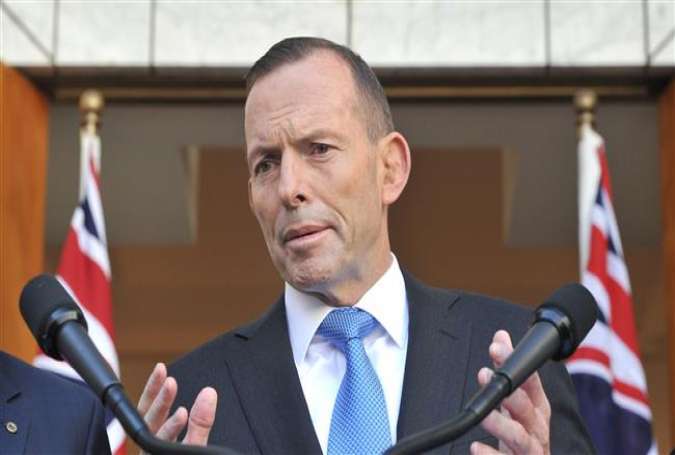 Australian Prime Minister Tony Abbott speaks to the media during a press conference at Parliament House in the capital, Canberra, on September 9, 2015.