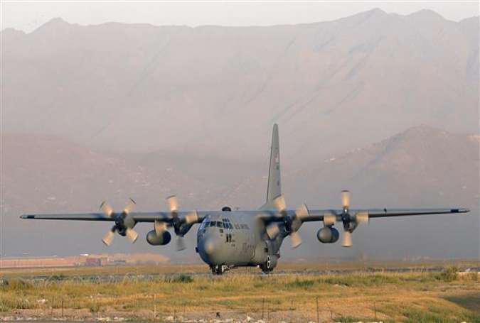 This file picture taken on August 19, 2012 shows a Lockheed C 130 Hercules of the US Air Force landing at the Kabul International airport, in Kabul. Eleven people, including six US troops, were killed when a C-130 military transport plane crashed on October 2, 2015 in Jalalabad in eastern Afghanistan, an official said.