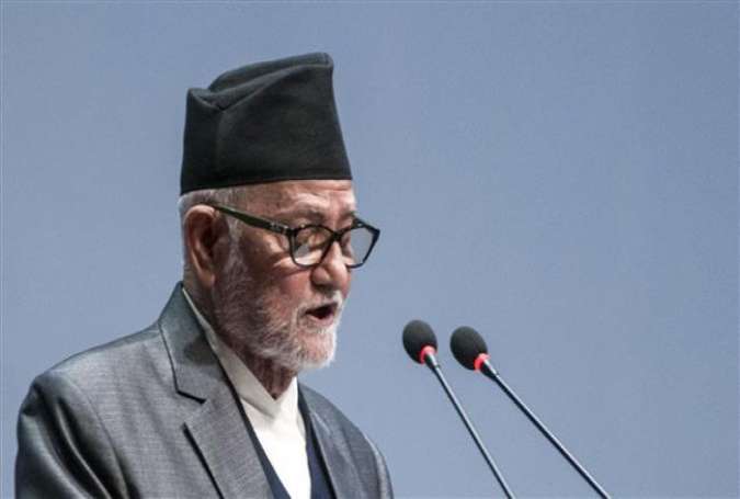 Outgoing Nepalese Prime Minister Sushil Koirala addresses lawmakers in parliament in Kathmandu on October 2, 2015.