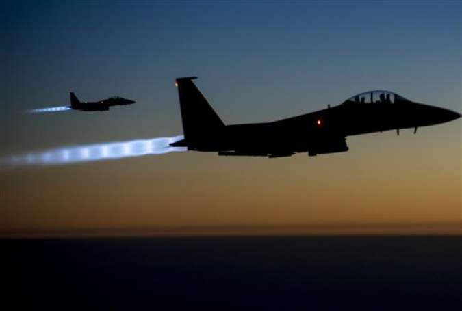A pair of US Air Force F-15 Strike Eagles flying over northern Iraq after conducting airstrikes in Syria, September 23, 2014.