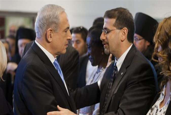 Prime Minister Benjamin Netanyahu (left) greets US Ambassador Dan Shapiro in April 2013.
