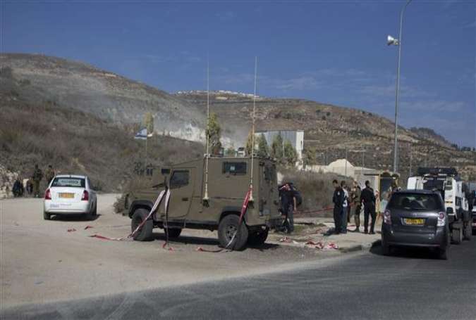 Israeli forces deploy to the scene of an alleged attack at the Huwwara checkpoint near the West Bank city of Nablus, November 22, 2015.