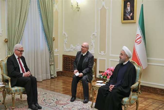 Iranian President Hassan Rouhani (R) meets with visiting German Foreign Minister Frank-Walter Steinmeier in Tehran on February 3, 2016.