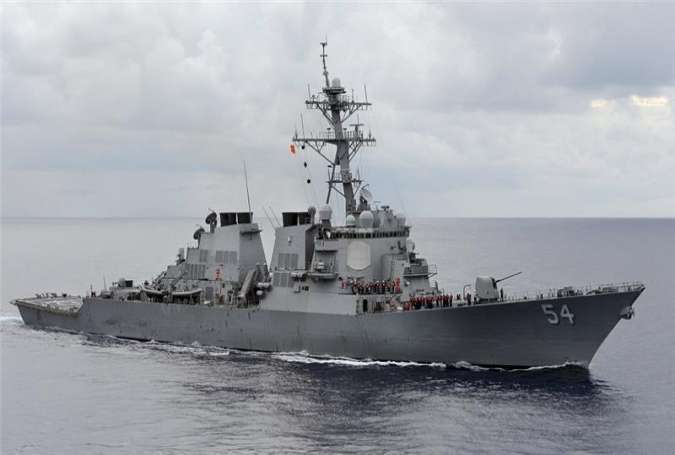 The US warship USS Curtis Wilbur sailed within 22 kilometres of an artificial island recently built by Beijing in the South China Sea.