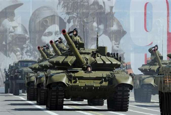 Russian T-72B3 tanks roll along Nevsky Prospect in central Saint Petersburg, May 5, 2015.
