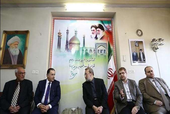 Iran’s Parliament Speaker Ali Larijani (3rd R) and a number of Iraqi parliamentarians meet in the Iranian city of Qom on February 27, 2016.