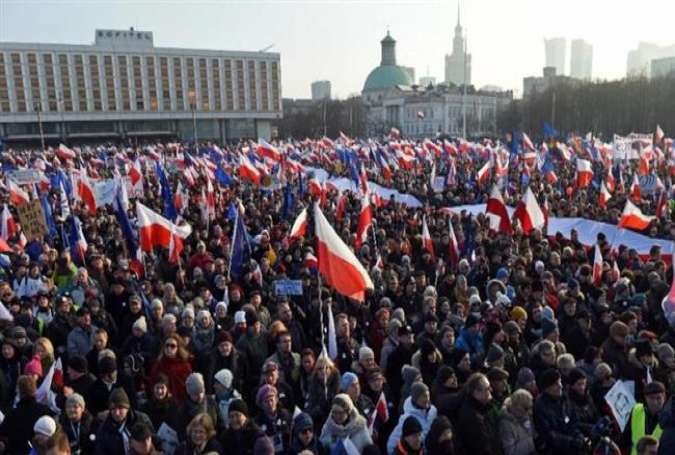 Polish protesters attend an anti-government demonstration in Warsaw, February 27, 2016.