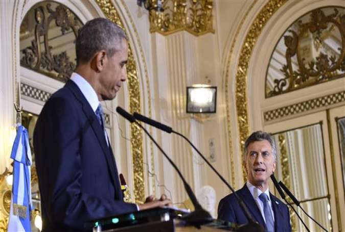 US President Barack Obama (L) and Argentinian President Mauricio Macri deliver a joint press conference at the Casa Rosada presidential palace in Buenos Aires on March 23, 2016.