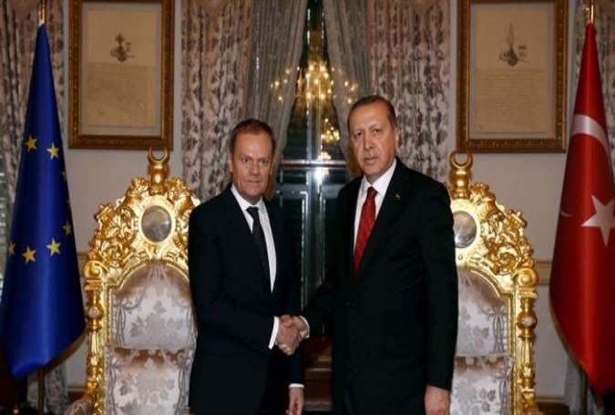 Turkish President Recep Tayyip Erdogan (R) meets with European Council President Donald Tusk in Istanbul, Turkey, on March 4, 2016, as part of negotiations over a deal to curb the massive influx of refugees into Europe. Under the pact, finalized on March 18, Ankara will be obliged to take back all illegal refugees deported from Greece while the EU will accept thousands of Syrian asylum seekers directly from Turkey.