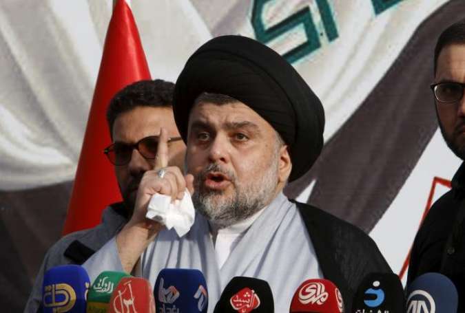 Prominent Iraqi cleric Muqtada al-Sadr speaks during a sit-in at the gates of Baghdad