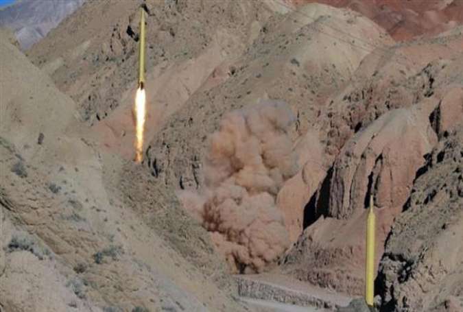 Iran test-fires ballistic missiles during large-scale drills on March 9, 2016.