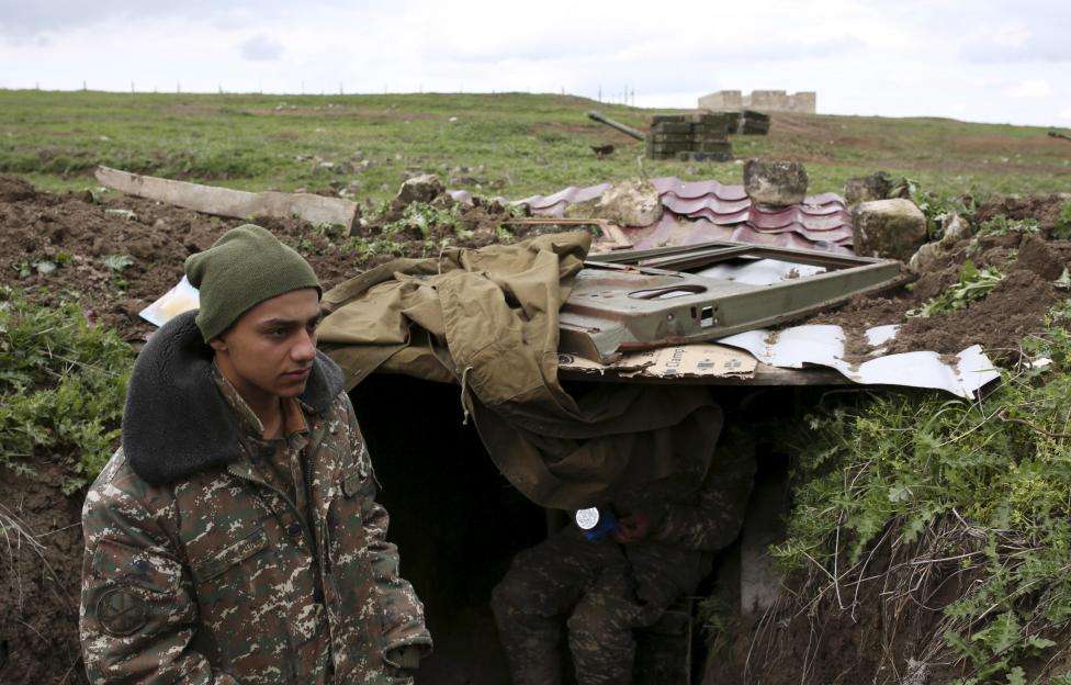 Soldiers of the self-defense army of Nagorno-Karabakh gather at their positions in Martakert province, which according to Armenian media was affected by clashes over the breakaway Nagorno-Karabakh region, April 4, 2016.