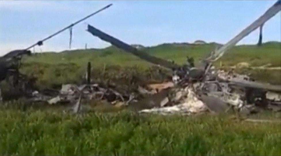 The wreckage of an Azeri Mi-24 helicopter which was downed during clashes with Armenian forces in Nagorno-Karabakh region, which is controlled by separatist Armenians, is seen in this still image taken from video provided by the Nagorno-Karabakh region D