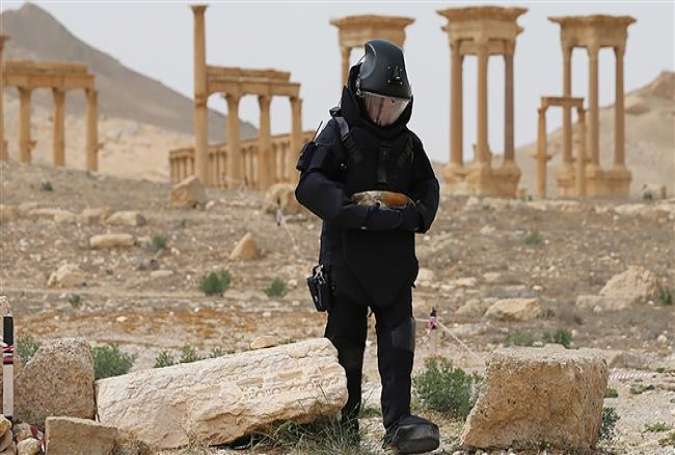 A Russian army sapper working in the ancient Syrian city of Palmyra.