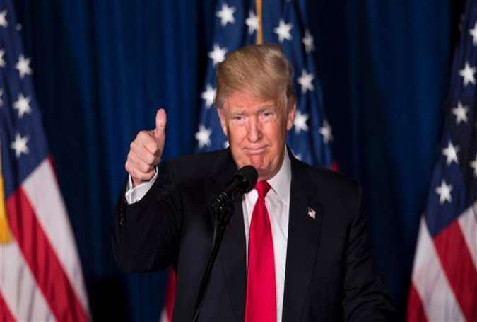 US Republican presidential candidate Donald Trump gives a thumbs up after delivering a foreign policy speech at the Mayflower Hotel April 27, 2016 in Washington, DC.