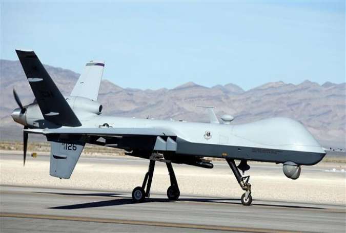 An MQ-9 Reaper remotely piloted aircraft taxis during a training mission at Creech Air Force Base in Indian Springs, Nevada, November 17, 2015.