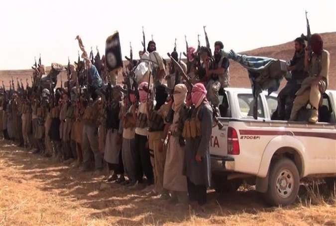 Takfiri Daesh terrorists in an undisclosed location in Iraq