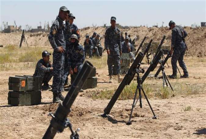 Iraqi government forces prepare mortar launchers on the outskirts of Fallujah, during a military operation to regain control of the city from Daesh, on June 13, 2016.
