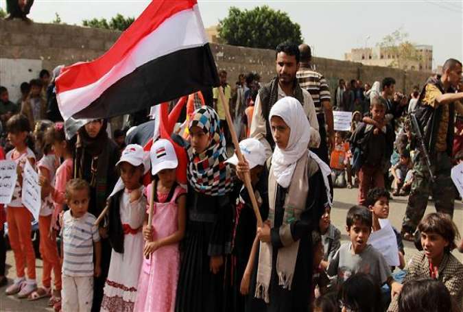 Yemeni children demonstrate against the removal of Saudi Arabia from the UN annual child rights blacklist, in front of the UN office in Sana’a, Yemen, on June 15, 2016.