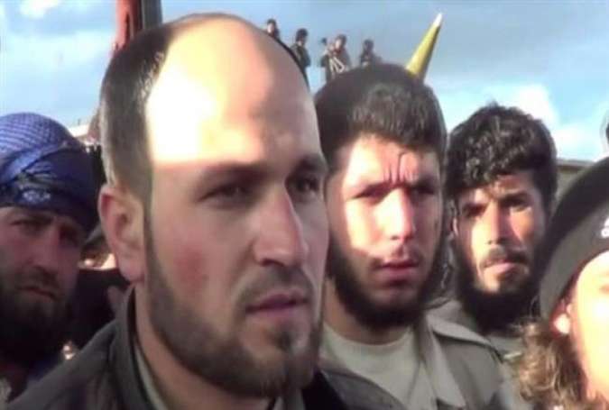 A file photo of Mohammad al-Ghabi (front), the commander of the US-backed “Jaish al-Tahrir” militant group in Syria