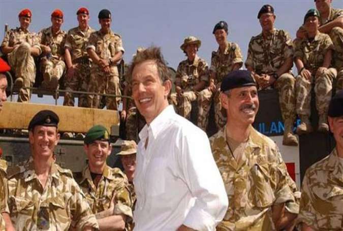 The picture taken on May 29, 2003 British Prime Minister Tony Blair meets with troops in Basra, Iraq.