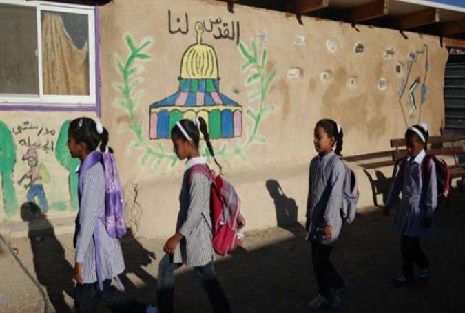 In this file photo, Palestinian Bedouin students arrive to school at Khan al-Ahmar, near the occupied West Bank city of Ariha (Jericho).