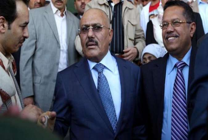 A file photo of Yemen’s former President Ali Abdullah Saleh (C)