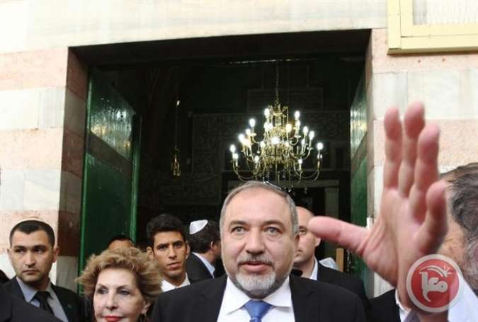 Israeli Foreign Minister Avigdor Lieberman visits the Ibrahimi mosque, or the Tomb of the Patriarch, a religious site to both Muslims and Jews.