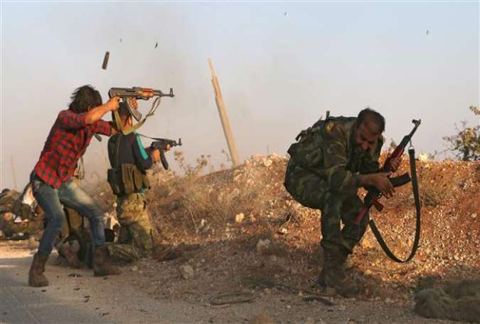 Militants of the so-called Free Syrian Army clash with Daesh terrorists in the northern Syrian village of Yahmoul in the Marj Dabiq area north of the embattled city of Aleppo on October 10, 2016.
