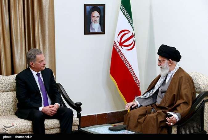 Iran’s Leader Ayatollah Seyyed Ali Khamenei (R) and Finnish President Sauli Niinistö meet in Tehran