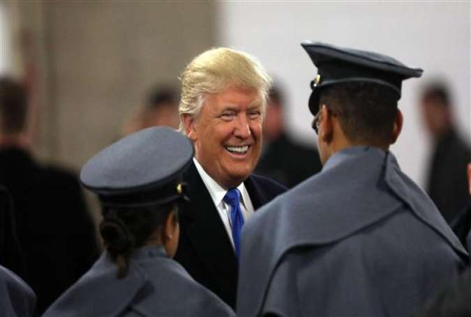 US President-elect Donald Trump meets with cadets from the military academies prior to the game between the Navy Midshipmen and the Army Black Nights at M&T Bank Stadium on December 10, 2016 in Baltimore, Maryland.