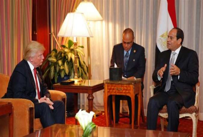 Then Republican presidential candidate Donald Trump (L) looks on as Egyptian President Abdel Fattah al-Sisi speaks during a meeting at the Plaza Hotel, New York, on September 19, 2016.