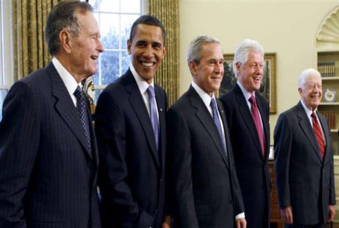 From left to right, former US president George H. W Bush, President Barack Obama, former presidents George W. Bush, Bill Clinton and Jimmy Carter