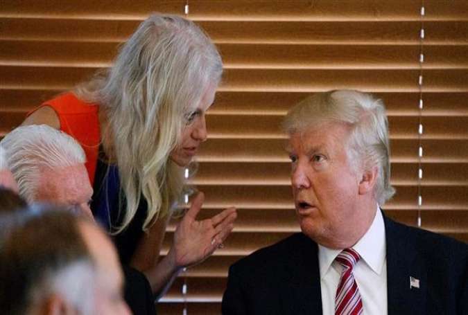 Donald Trump (right) talks with Kellyanne Conway