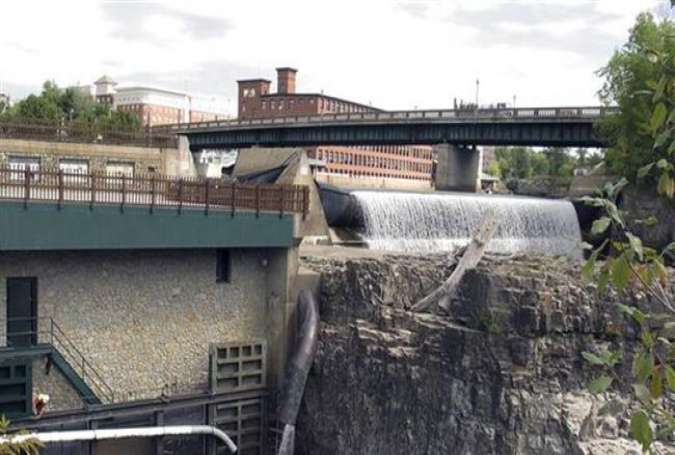 Water flows through the Winooski 1 hydro-electric plant in Winooski, Vermont, on September 10, 2014.